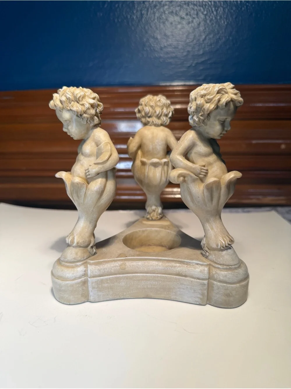 Vintage Resin Cherub Candle Holder features Three Cherubs Popping Out Of Flowers